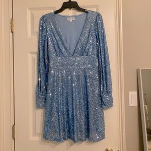 Light blue sequin formal dress size medium. Never been worn in perfect condition